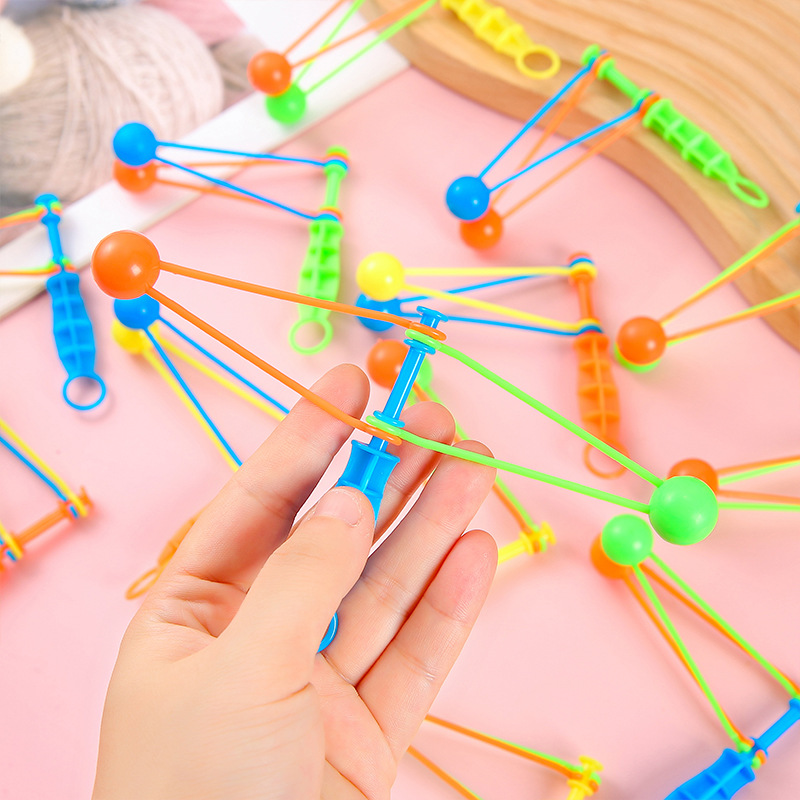Children's nostalgic toys, hand-cranked bump balls, casual small toys, rocking fans, plastic bump balls, boring toys details Picture
