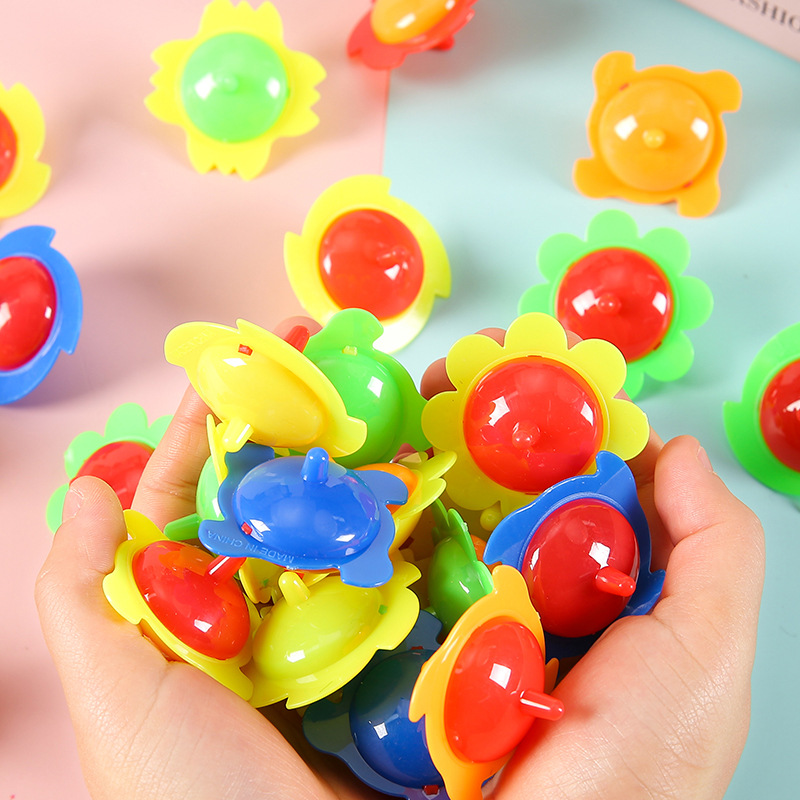 Two-color lace spinning top, traditional and nostalgic colorful top, children's gift, educational small top, small toy wholesale Application Scenario