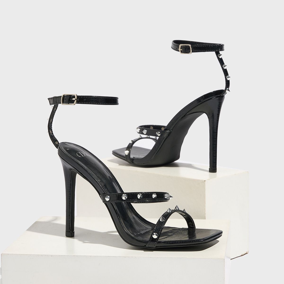 New high-heeled, pointed metal riveted, one-line buckle, thin-heeled, cross-border, large-sized red open-toe sandals for women from Europe and America Application Scenario