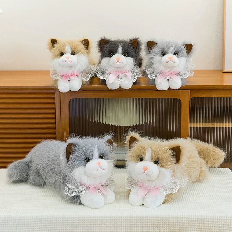 A cute plush toy doll with a simulation of a lying cat is a birthday gift for my girlfriend to comfort her cat