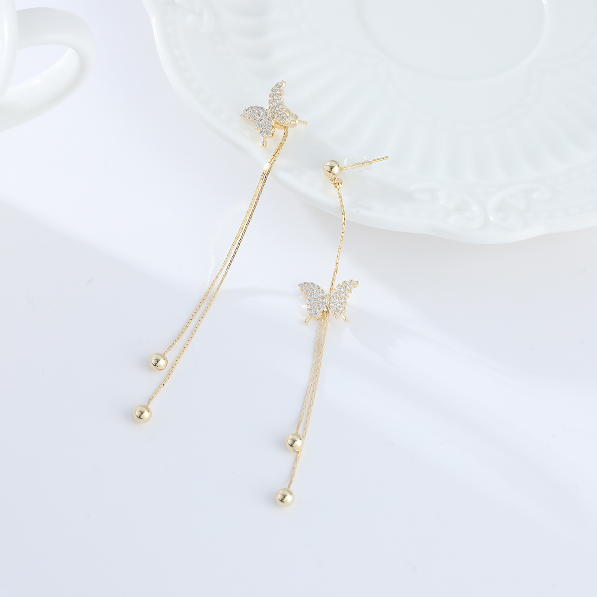 Xuhui brand exquisite and light luxury copper-plated with real gold and zircon inlaid 925 silver needle detachable butterfly long design super fairy luxury design fashionable stud earrings details Picture