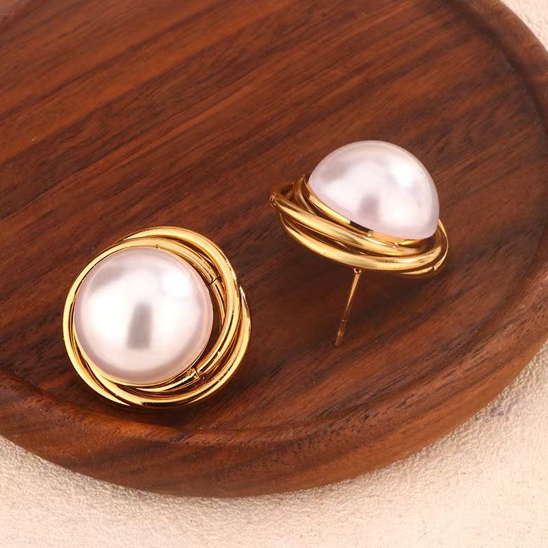 Silver needle, European and American cross-border round flower stud earrings, vintage earrings, retro and high-end earrings wholesale for women