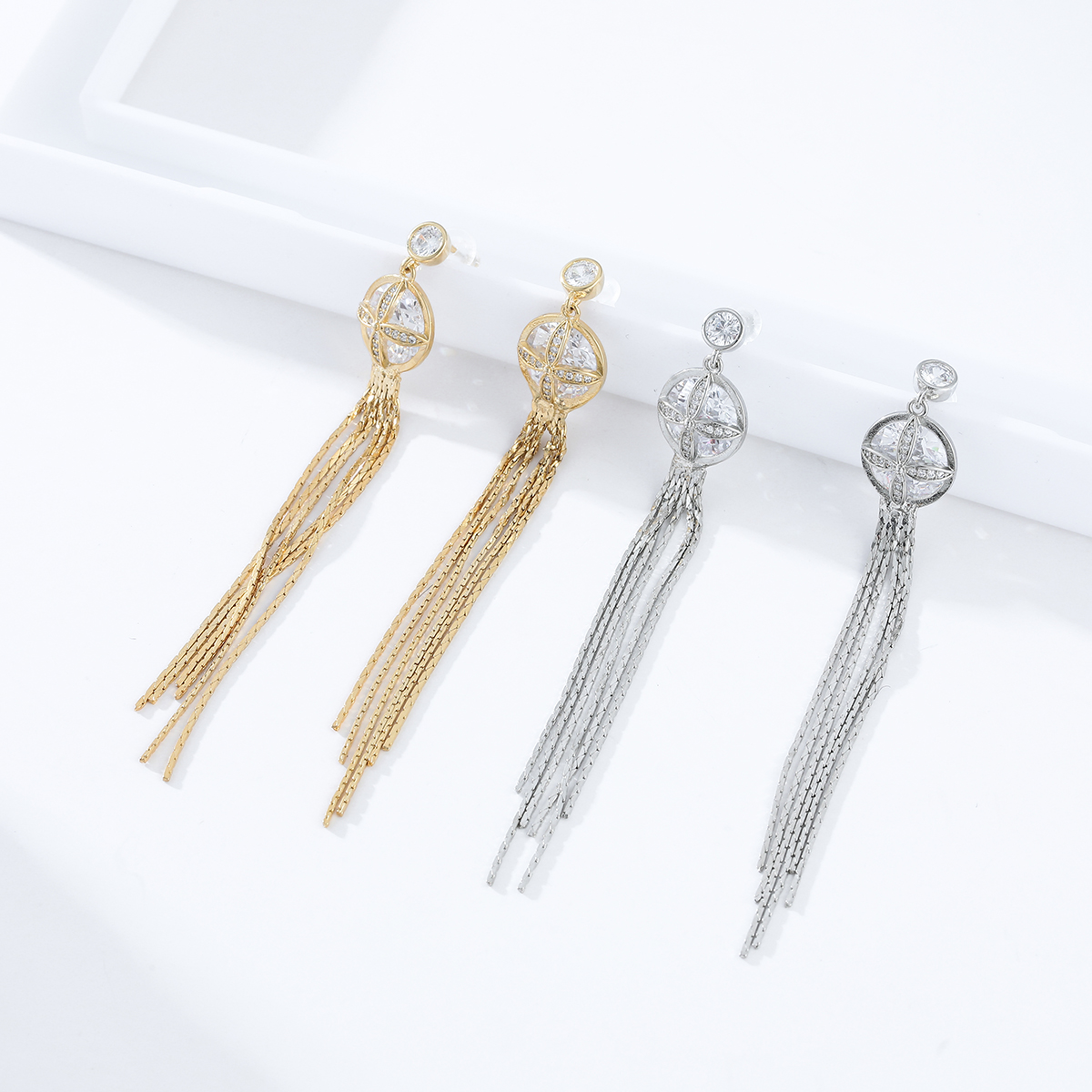 Xuhui brand exquisite and light luxury copper plated with real gold and zircon inlaid S925 silver needle, luxurious and super fairy tassel design ear hooks Application Scenario