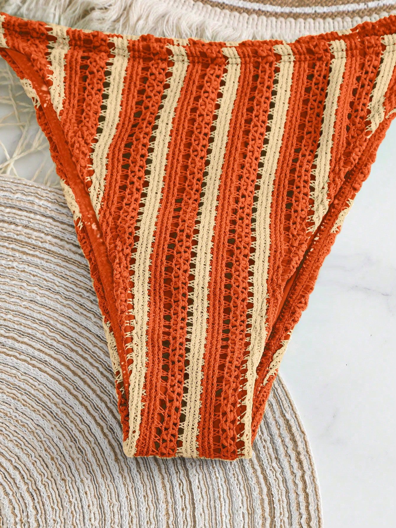 Back view of lace-up bikini showing adjustable drawstrings and fit