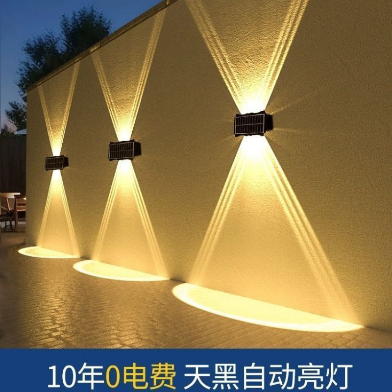 The new solar-powered garden lamp, outdoor waterproof, exterior wall decoration, outdoor wall lamp, and fence atmosphere lamp emit light up and down full figure