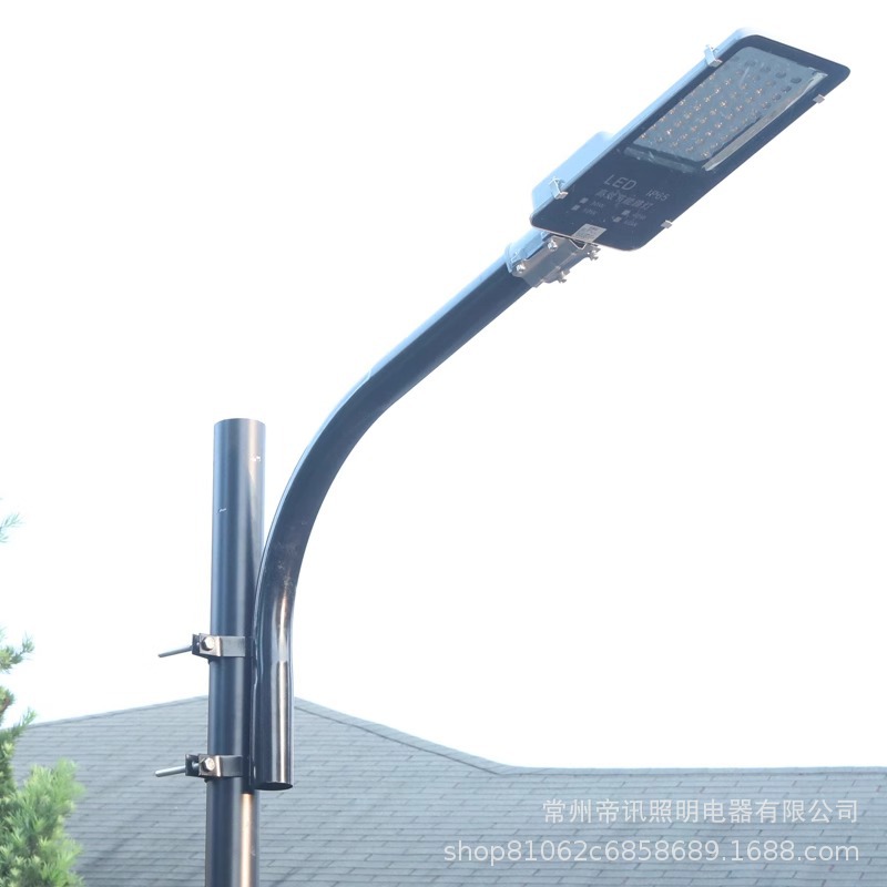 A 3-meter courtyard lamp is being renovated and equipped with a 50W220v ultra-bright led boom street lamp head for the community park and rural outdoor lighting Application Scenario