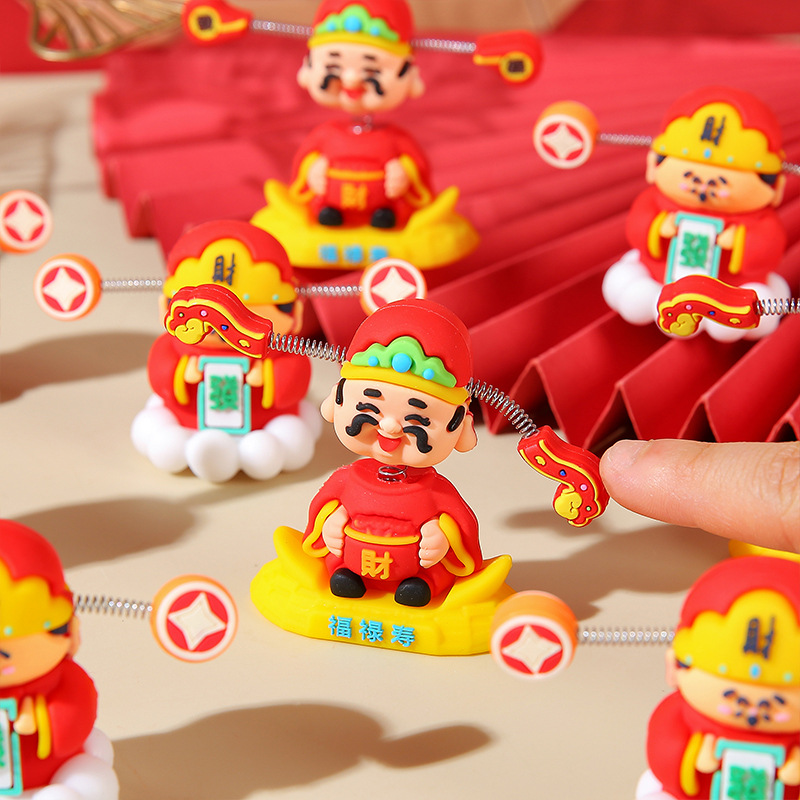 Cute little God of Wealth figure-piece, soft rubber figure-piece for the Year of the Snake, New Year decoration, national trend car shaking head God of Wealth figure-piece toy Application Scenario