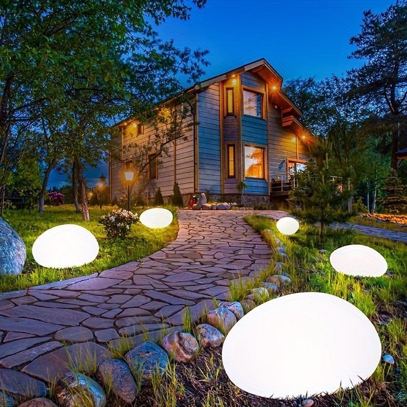 Luminous stone lamps, solar outdoor lawn lamps, courtyard decorative lamps, garden villa yard pebble lamps details Picture