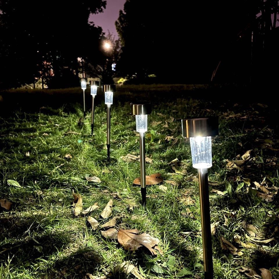 Solar lamps, stainless steel small tube lamps, outdoor garden lamps, automatic lighting at dark, lawn atmosphere lamps, campsite plug-in lamps Application Scenario
