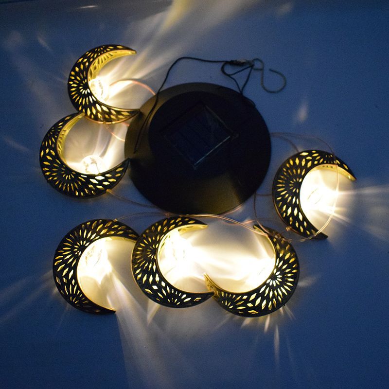 Outdoor solar garden lights, European retro hollowed-out garden lights, moon wind chime pendants, landscape atmosphere decorative lights Application Scenario