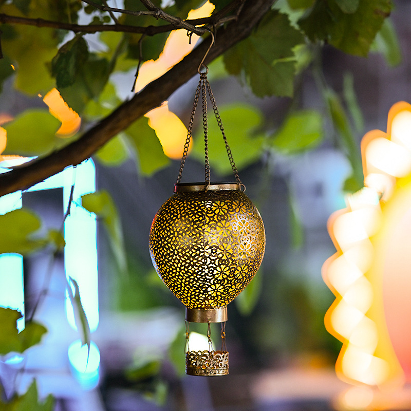 Wholesale of Amazon outdoor solar retro palace lanterns, courtyard hand-held lanterns, garden decoration, hollowed-out projection lanterns details Picture
