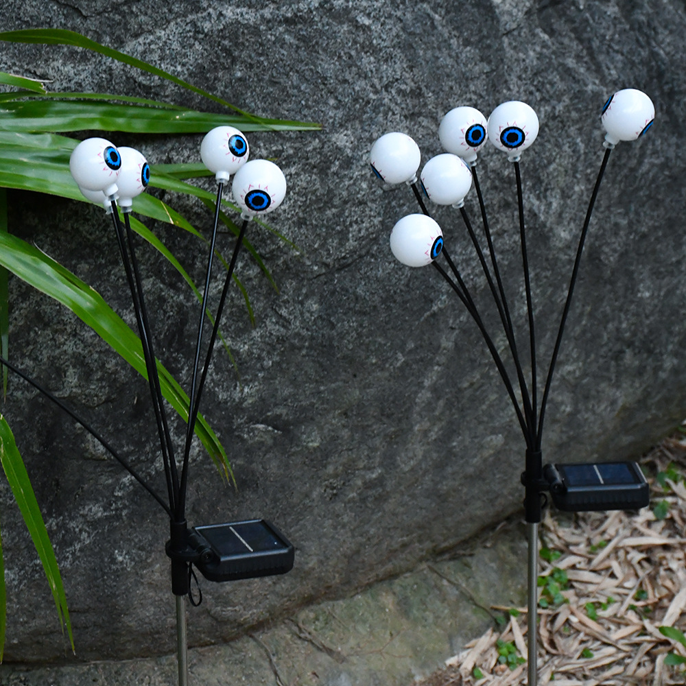 Cross-border solar Halloween Ghost eye lights, outdoor courtyard festival atmosphere party decorative lights, firefly eye lights Application Scenario