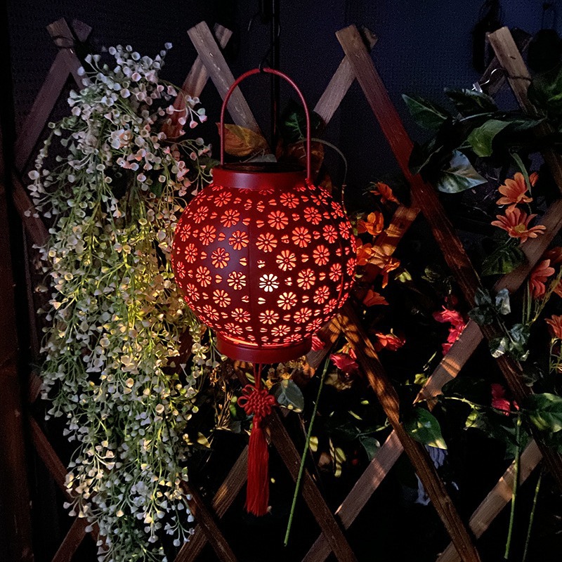 Wholesale solar metal carved red lanterns, ironwork hollowed-out projection lights, garden and courtyard landscape decorative hanging lights details Picture