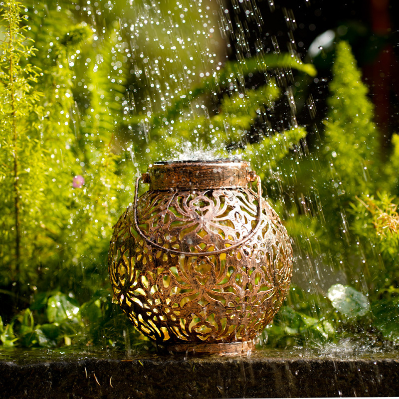 Solar-powered iron lanterns, hollowed-out lamps, outdoor waterproof garden lamps, decorative landscape garden lawn lamps, ornaments, hanging lamps Application Scenario