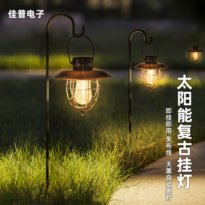 Cross-border solar ironwork hanging lamps, hollowed-out tungsten filament lanterns, retro hand-held lamps, outdoor garden lamps, lawn decorative lamps full figure
