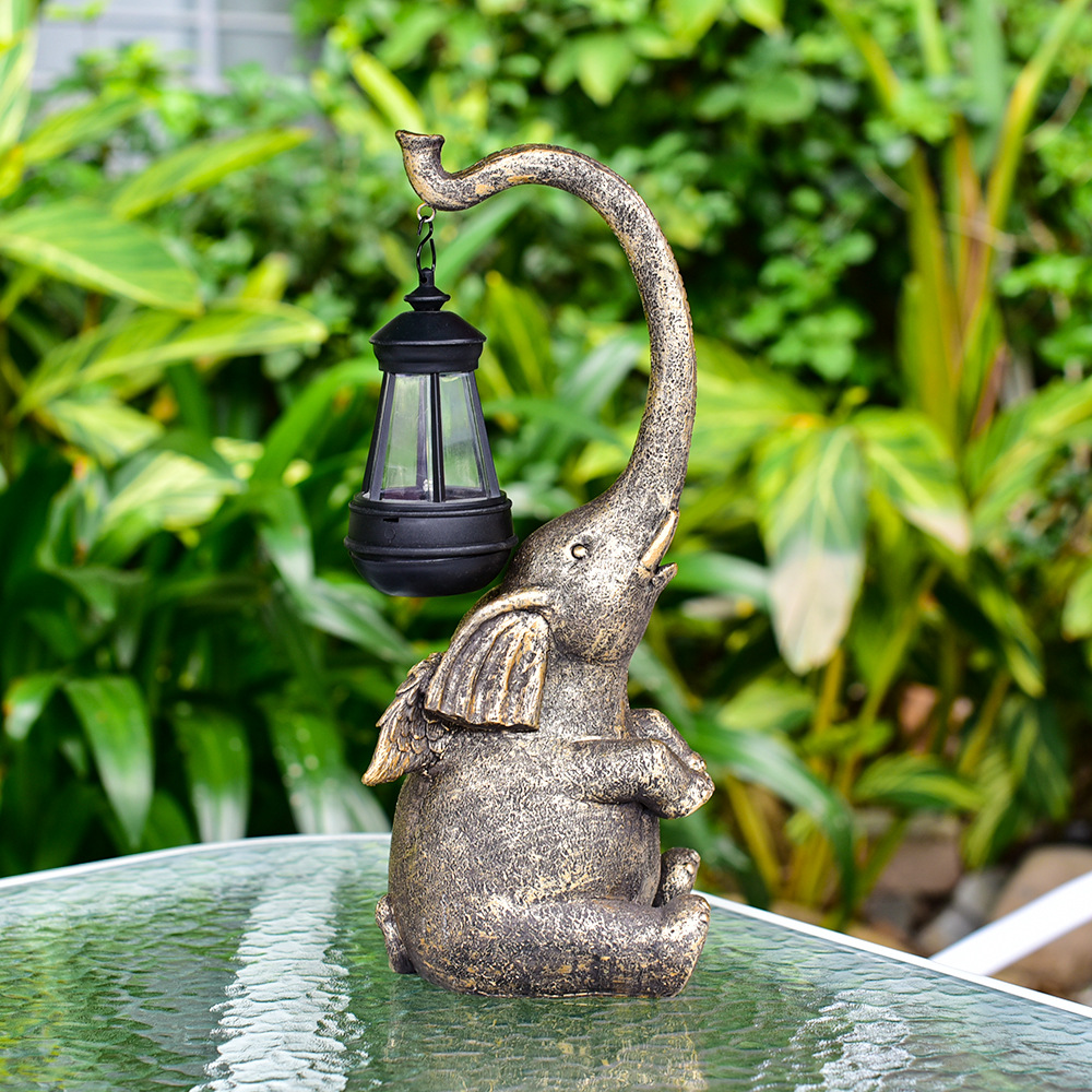 Amazon outdoor solar resin lamps, elephant statue ornaments, courtyard garden statues, decorative resin handicrafts full figure