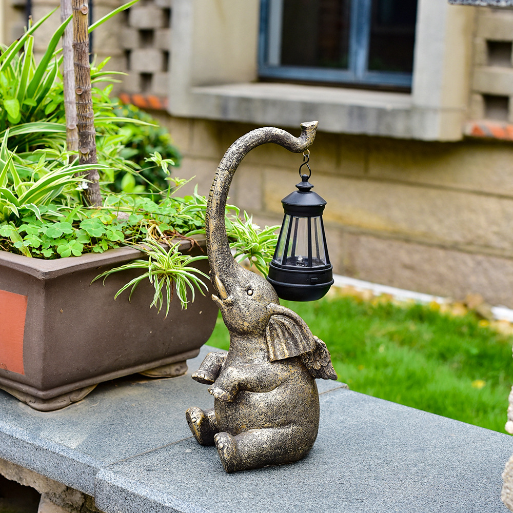 Amazon outdoor solar resin lamps, elephant statue ornaments, courtyard garden statues, decorative resin handicrafts details Picture