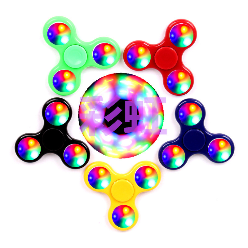 Cross-border factory direct sales vibration switch flashing running light fingertip gyroscope, stress-relieving and environmentally friendly plastic luminous toy full figure