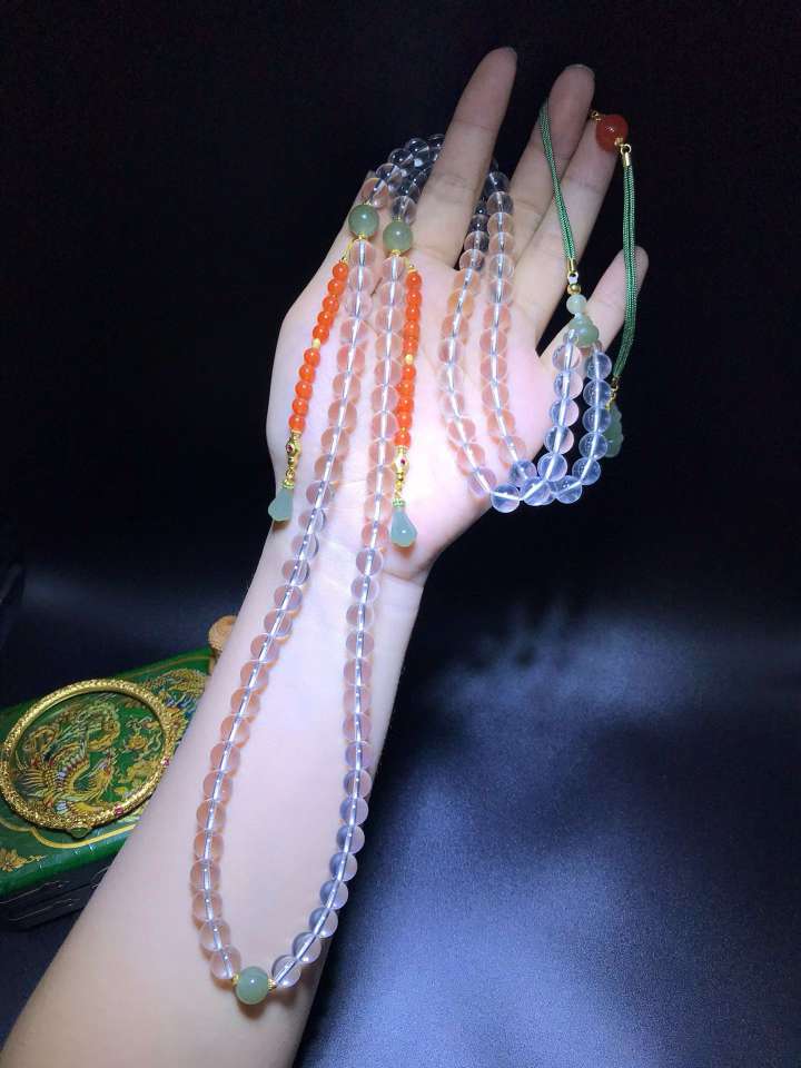 道毅珠宝白水晶手串8毫米108粒朝珠搭配青玉圆珠三通如意玉兰花蓝红圆珠回纹珠925银配件新中式禅意风配饰项链手串水晶手串产品图