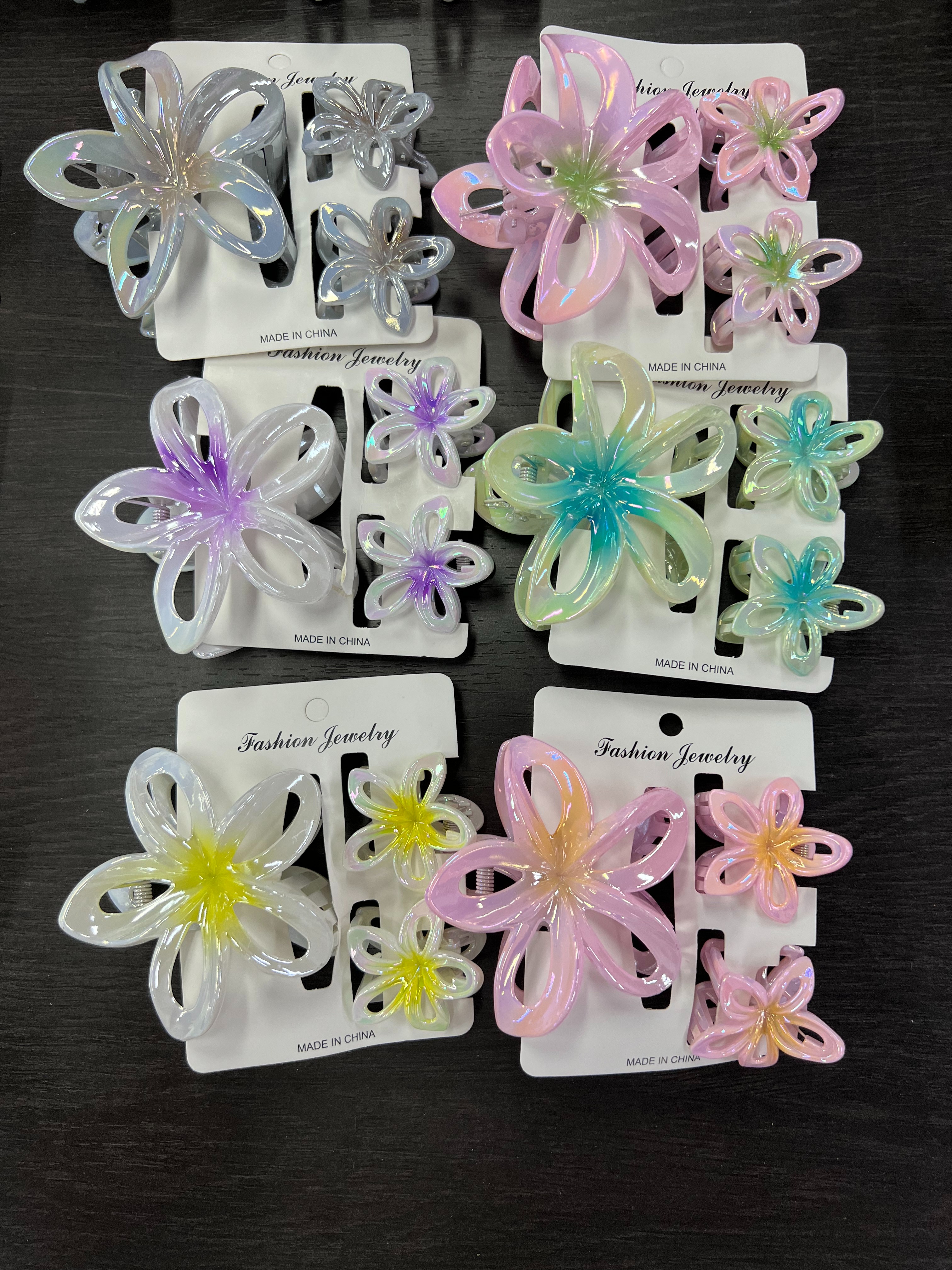 The summer Amazon gradient candy-colored frangipani hairpin is cute and sweet. The side clip is a teenage girl's hair accessory Item Picture