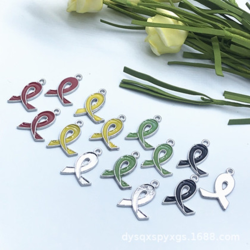 Cross-border best-selling international AIDS pink bow brooch, alloy material button, public welfare volunteer badge ribbon