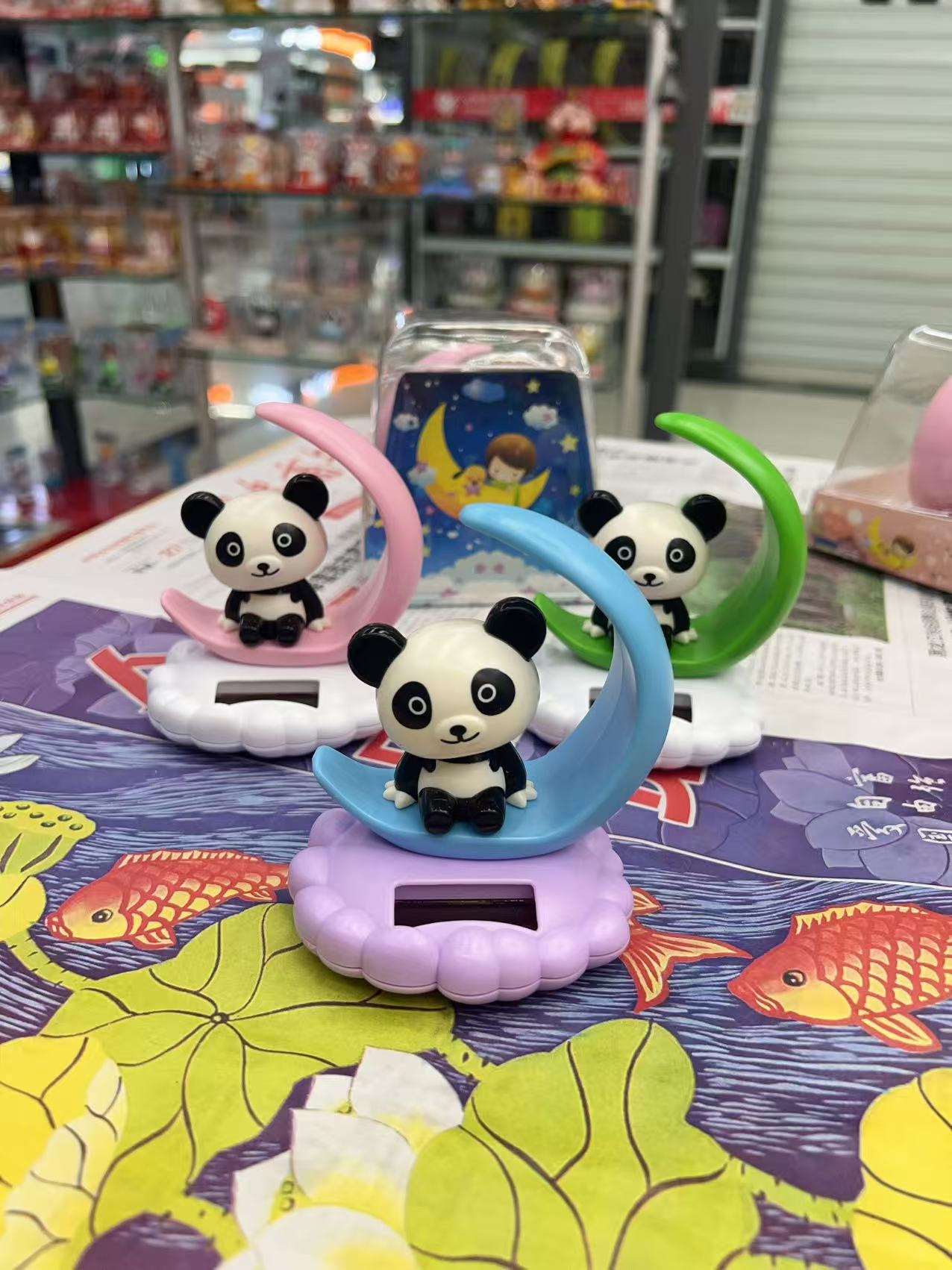 Cartoon dolls, solar car ornaments, car accessories, creative and cute doll gifts, pandas, frogs, KT cats Item Picture