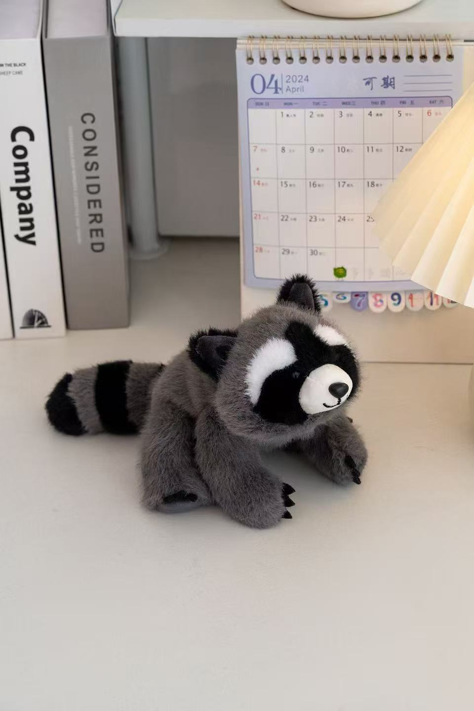 18cm fragrant gray and black patterned crouching little raccoon plush doll, soft and cute black and white face doll, palm palm healing and companion little decoration Application Scenario