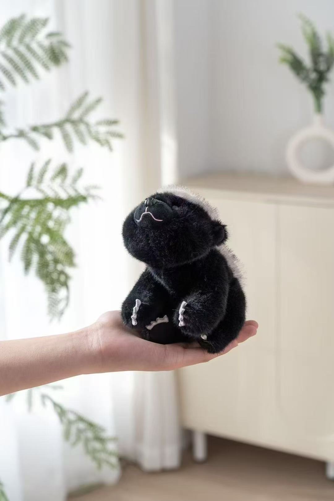 18cm fragrant black and white color-matched crouching honey badger plush toy, soft and cute "Flat-headed Brother" doll, palm personalized companion small ornament