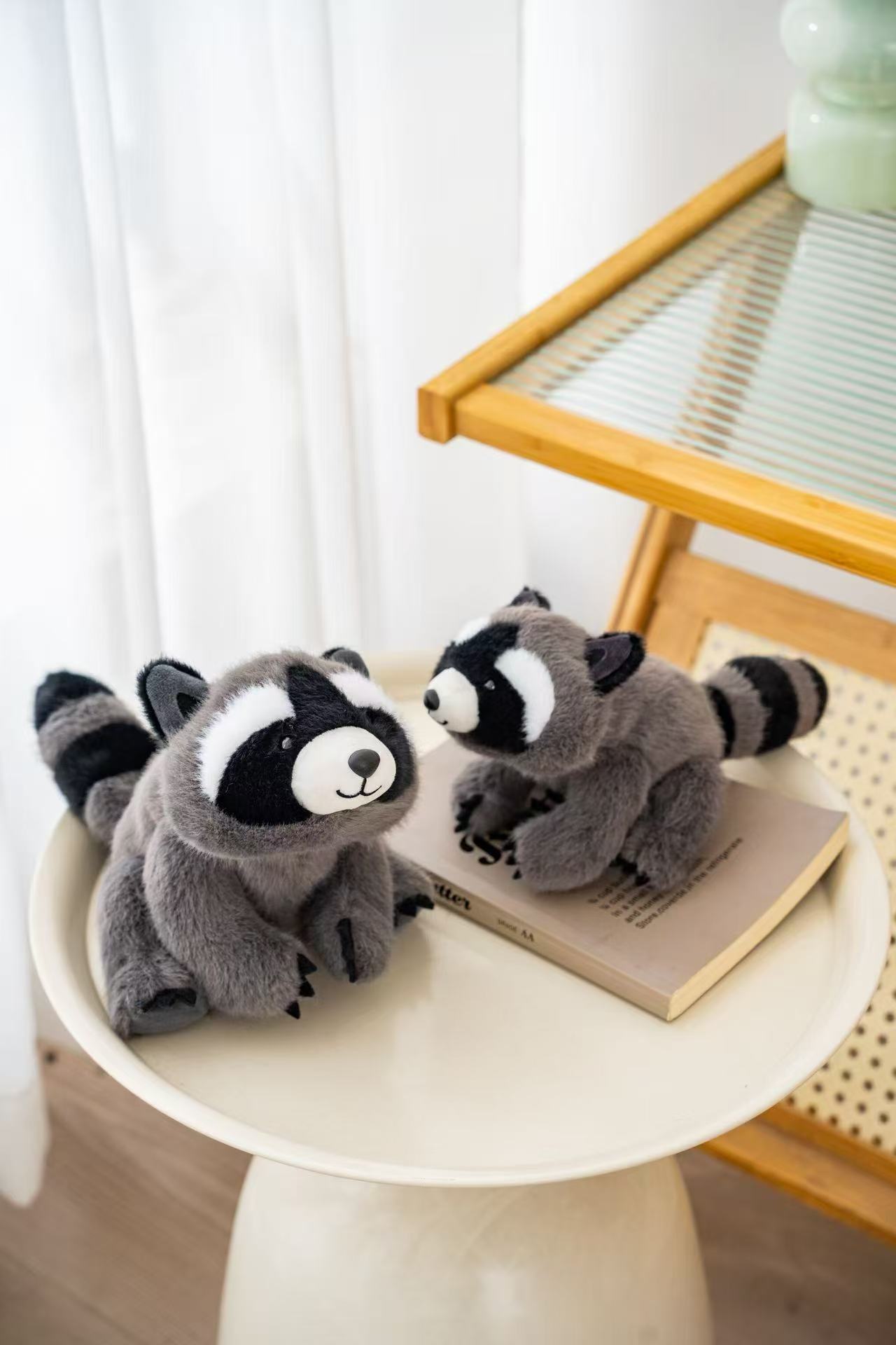 18cm fragrant gray and black patterned crouching little raccoon plush doll, soft and cute black and white face doll, palm palm healing and companion little decoration Specification image