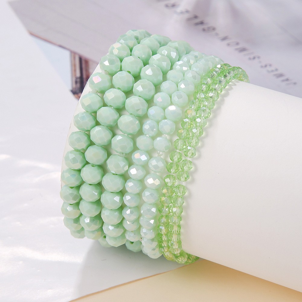 A set of 7 Bohemian-style simple cut colored crystal beaded bracelets for both men and women is selling well in the Middle East Specification image