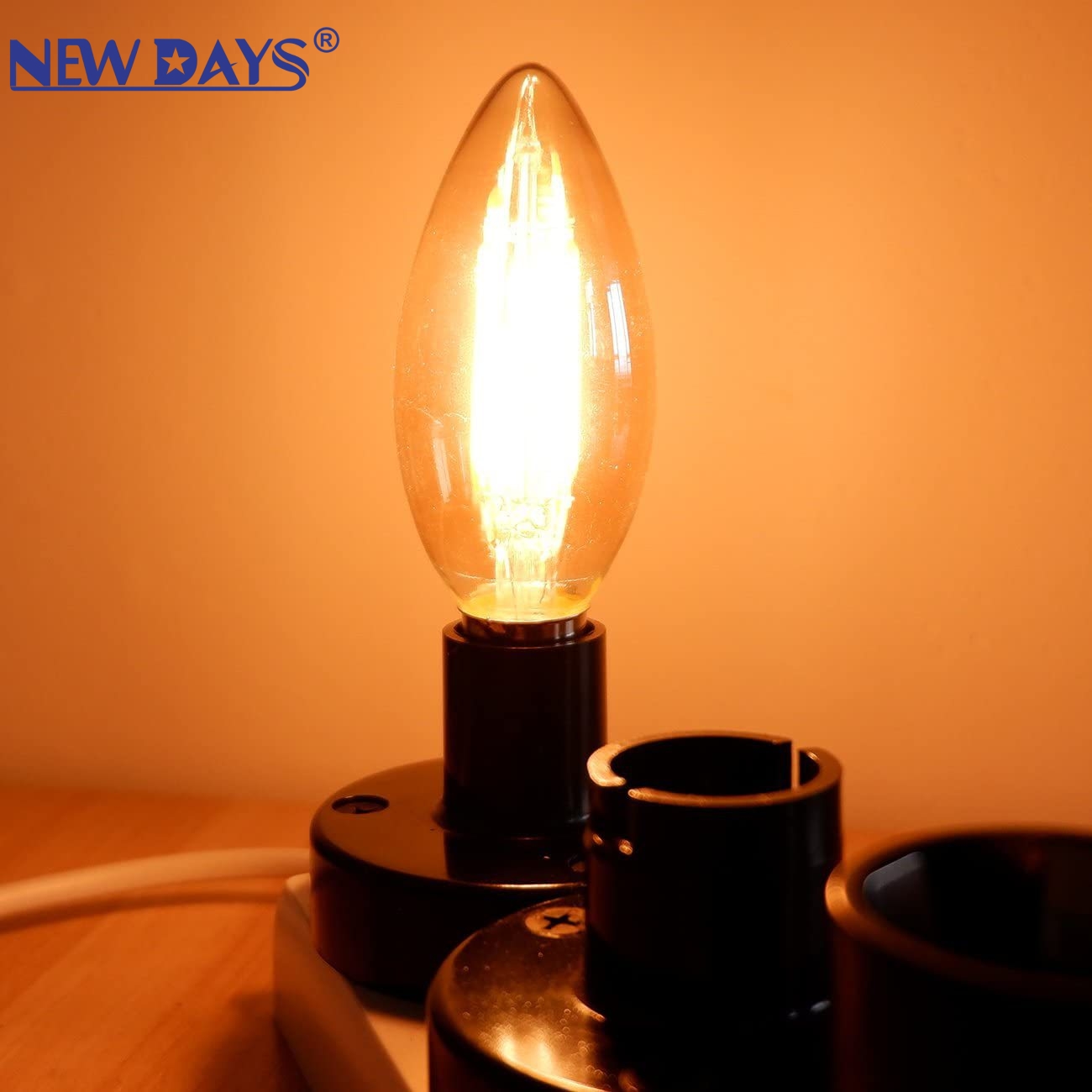 والمصابيح الجديدة من نوع "Newdays" العابرة للحدود والمصابيح "LED" المصنوع C35 المصنوع من نوع "LED"، هي مصابيح شمعة من نوع فراميت من نوع العنبر