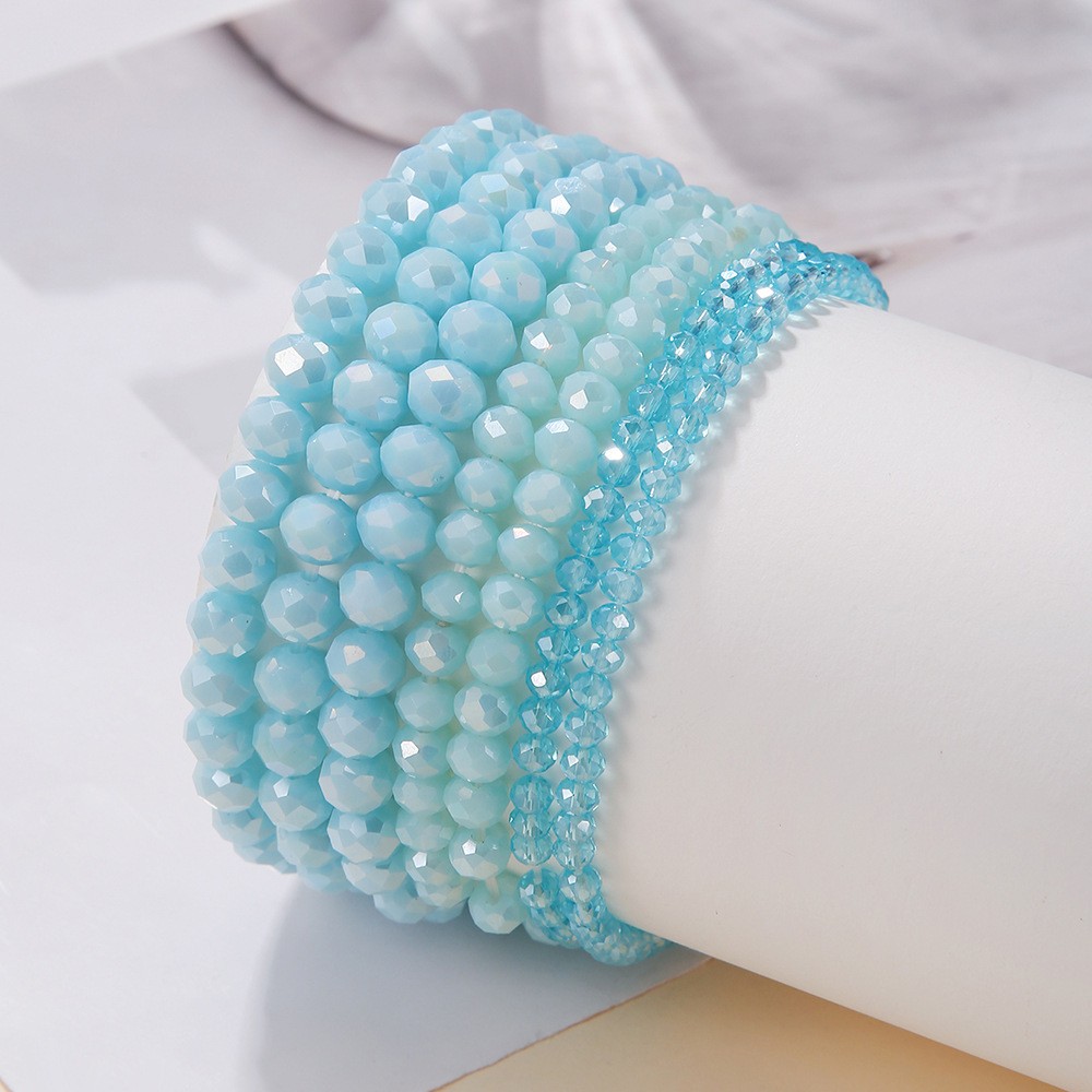 A set of 7 Bohemian-style simple cut colored crystal beaded bracelets for both men and women is selling well in the Middle East details Picture