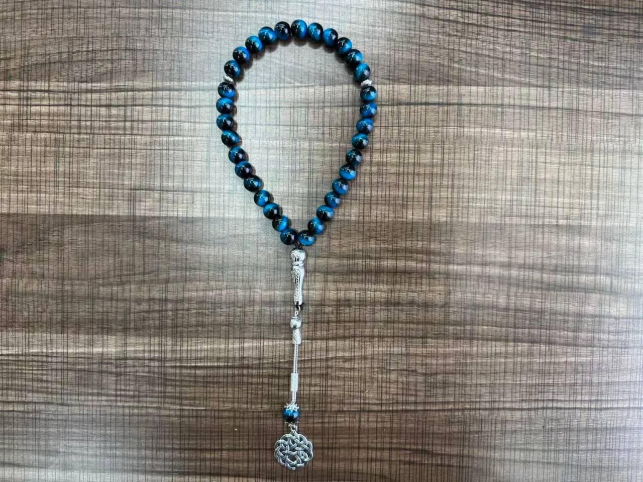 A new 33-piece hand-held prayer multi-color glass prayer bead from the Middle East Item Picture