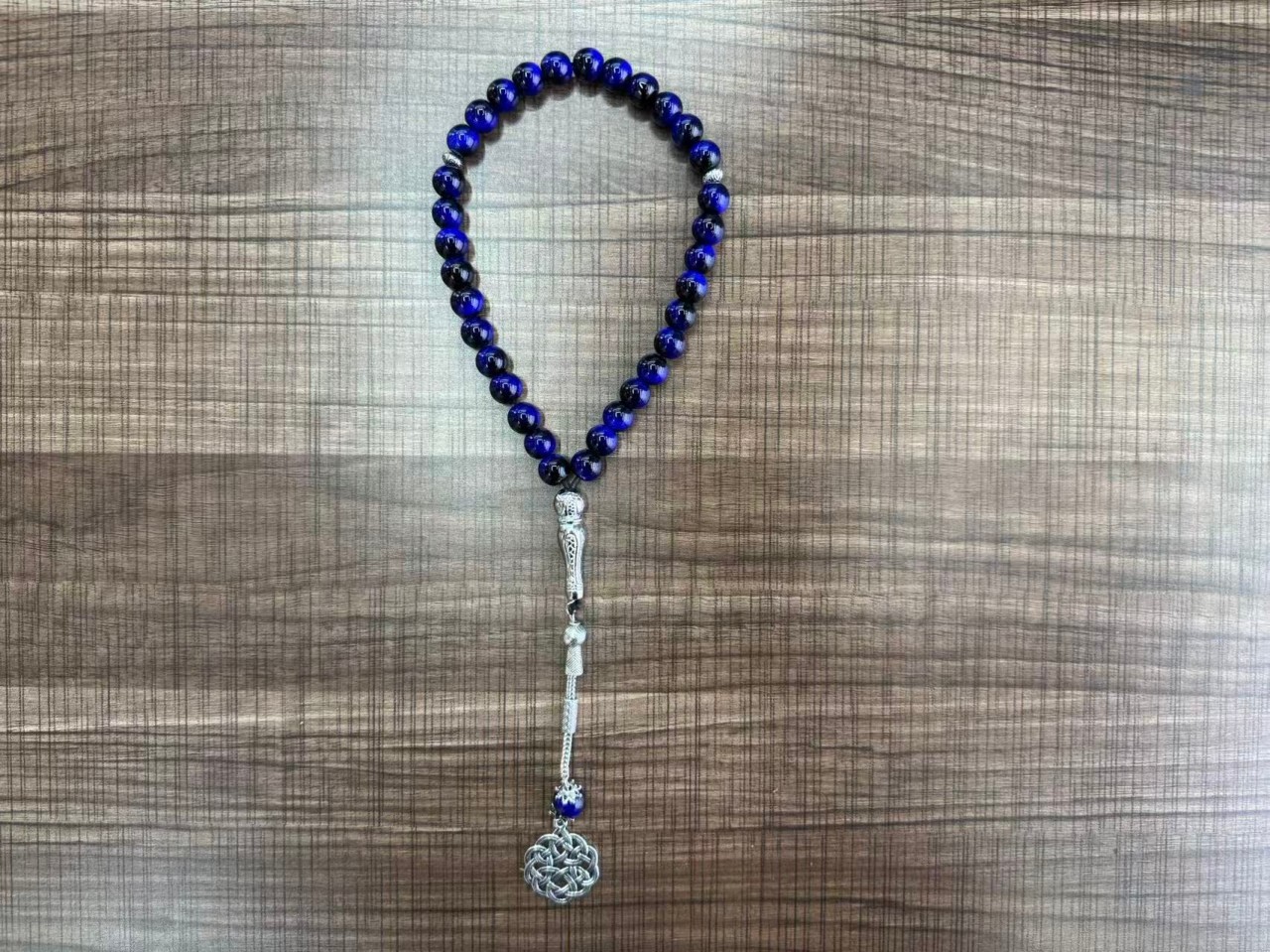 A new 33-piece hand-held prayer multi-color glass rosary that is selling well in the Middle East Item Picture