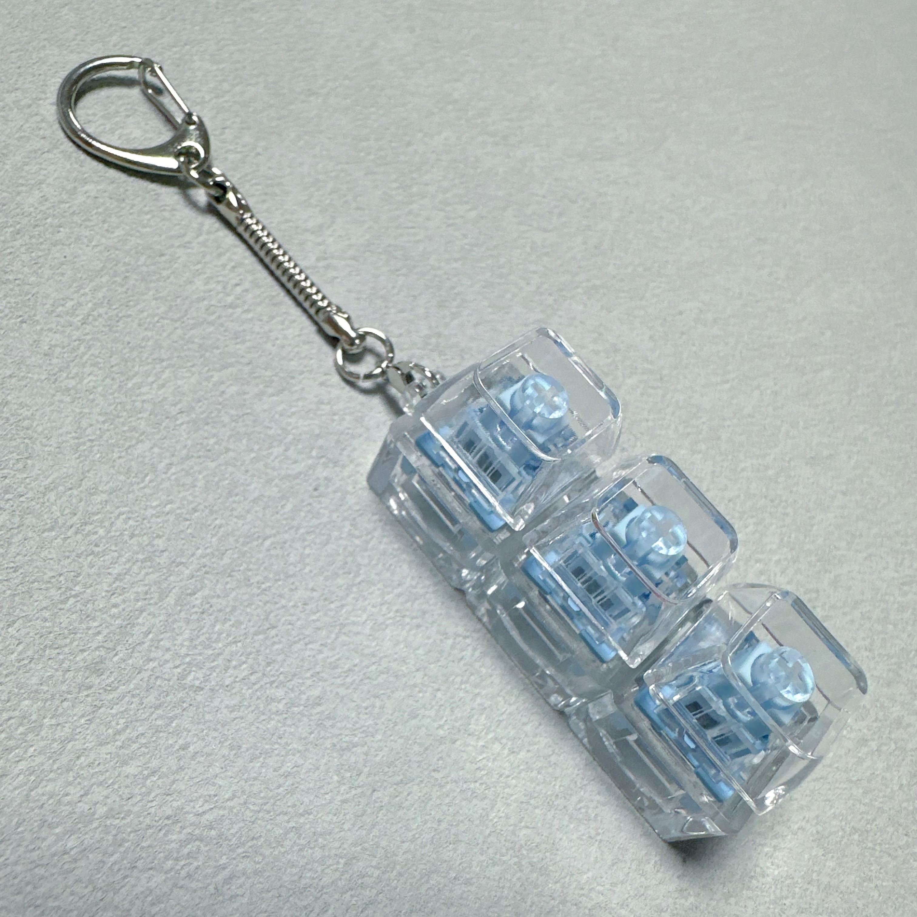 跨境3键轻音静音多色透明减压按键玩具解压神器试轴器方糖钥匙扣