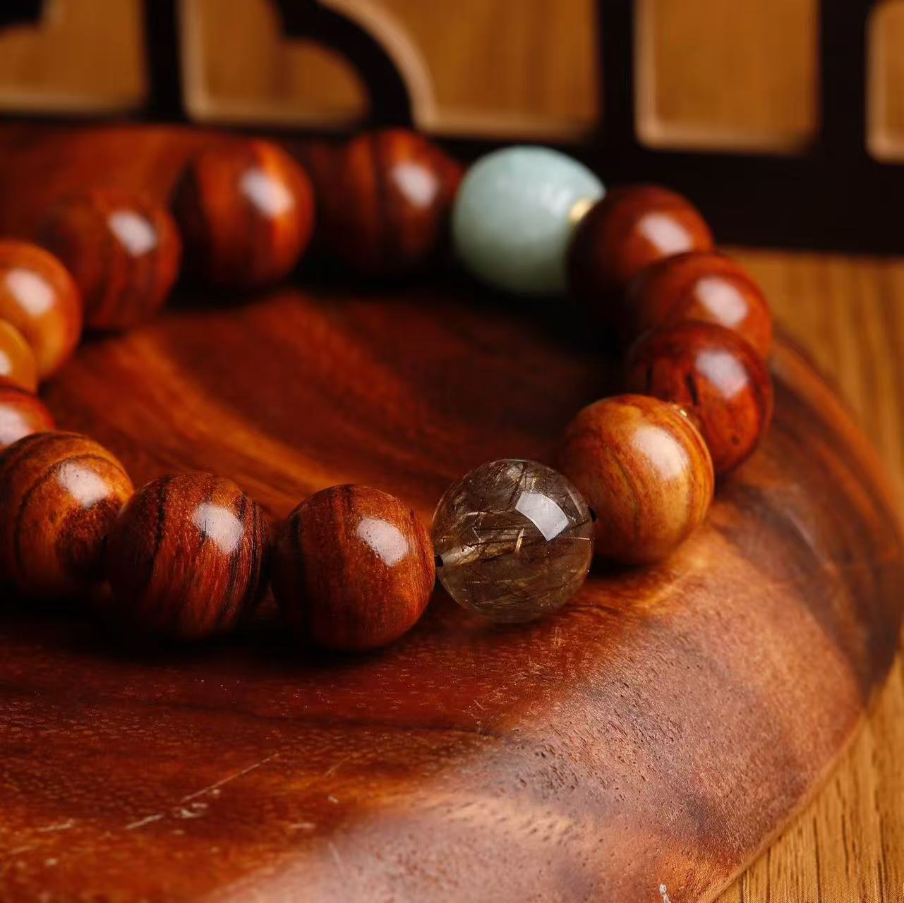 道毅珠宝天然海南黄花梨手串手链老蜜蜡绿色翡翠路路黑金超石产品图