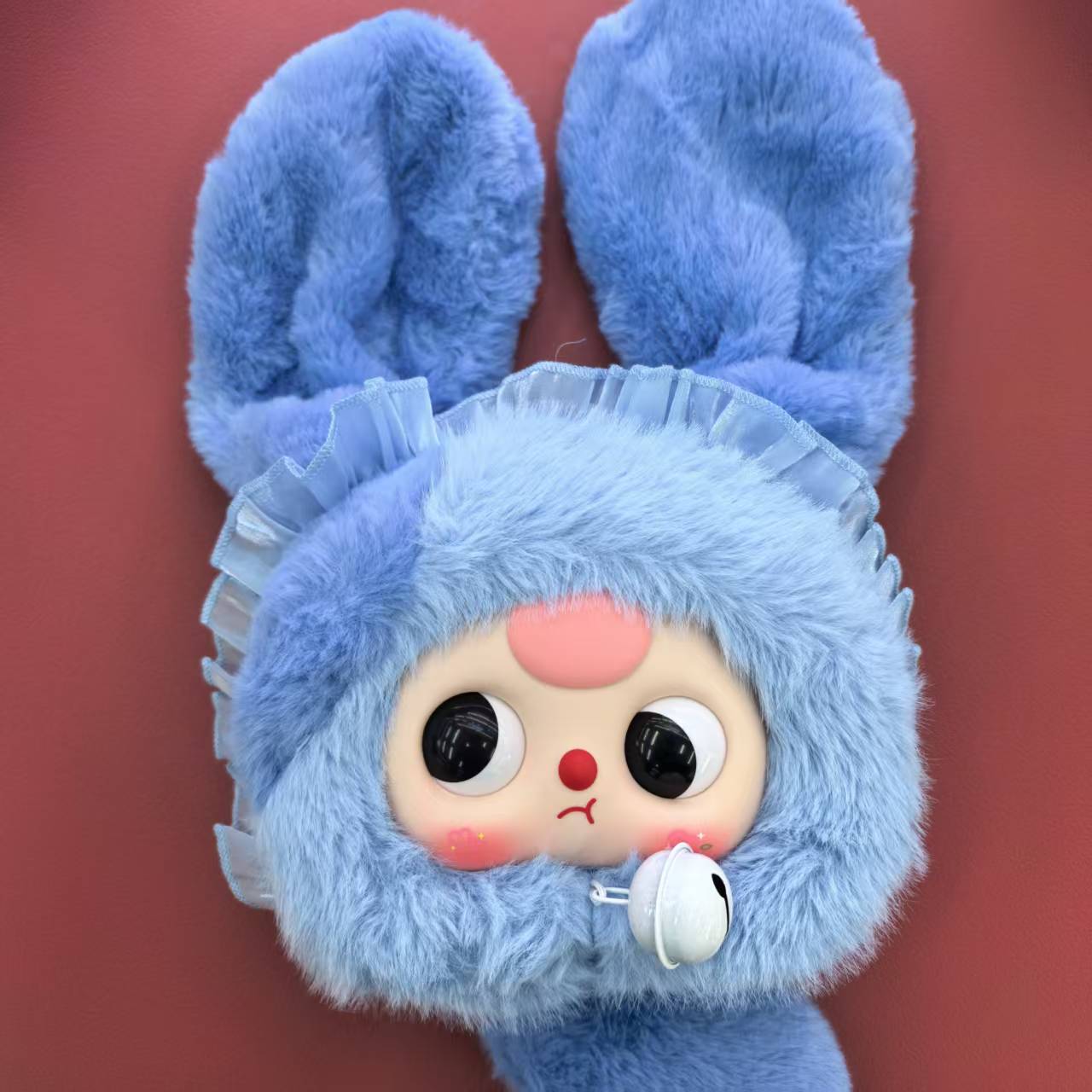 A Japanese-style Harajuku blind box for a three-year-old kid with a zipper bag, featuring a sweet and cool mixed design and a glossy finish. It's a trendy item for anime fans