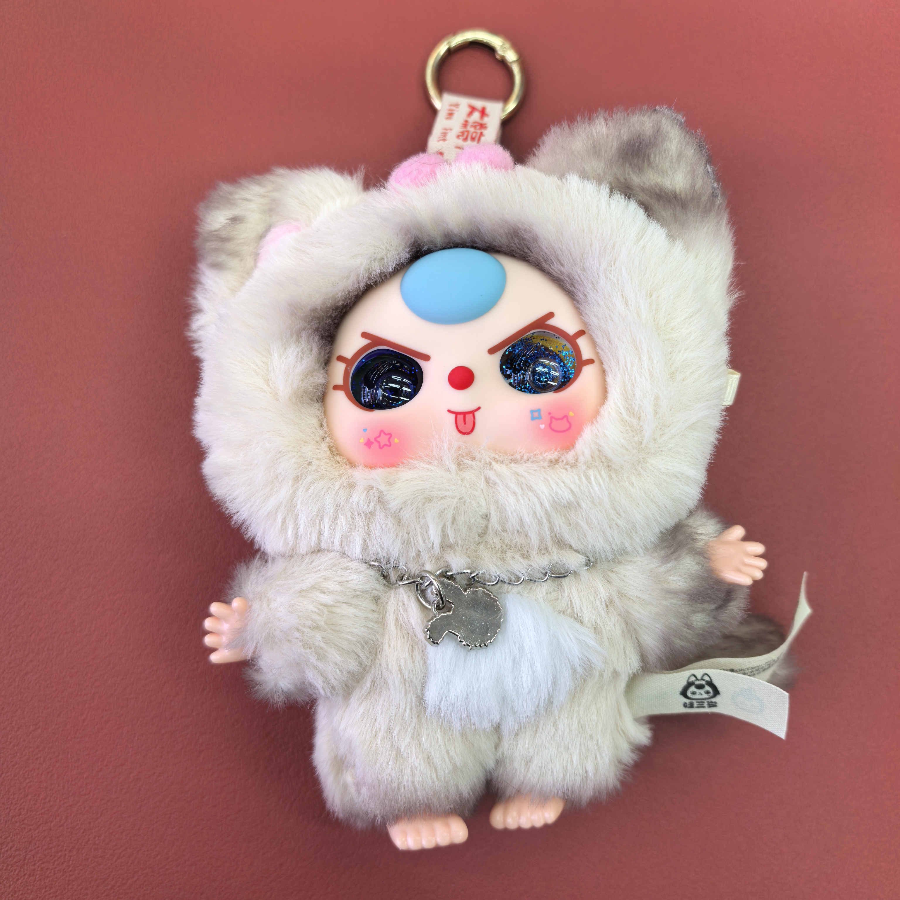 A three-year-old kid, a cat and a dog, rebellious noble blind box, with a contrast aesthetic design, is a spiritual symbol that is not defined. It's a trendy toy details Picture