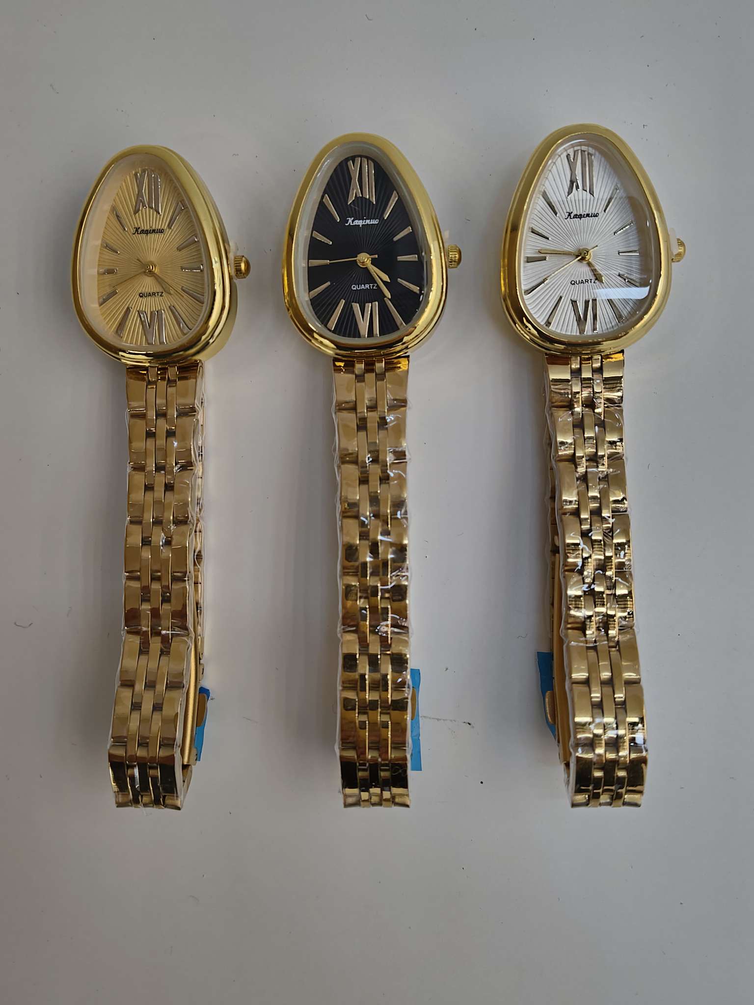 Best-selling snake-head shaped women's steel band watch in gold