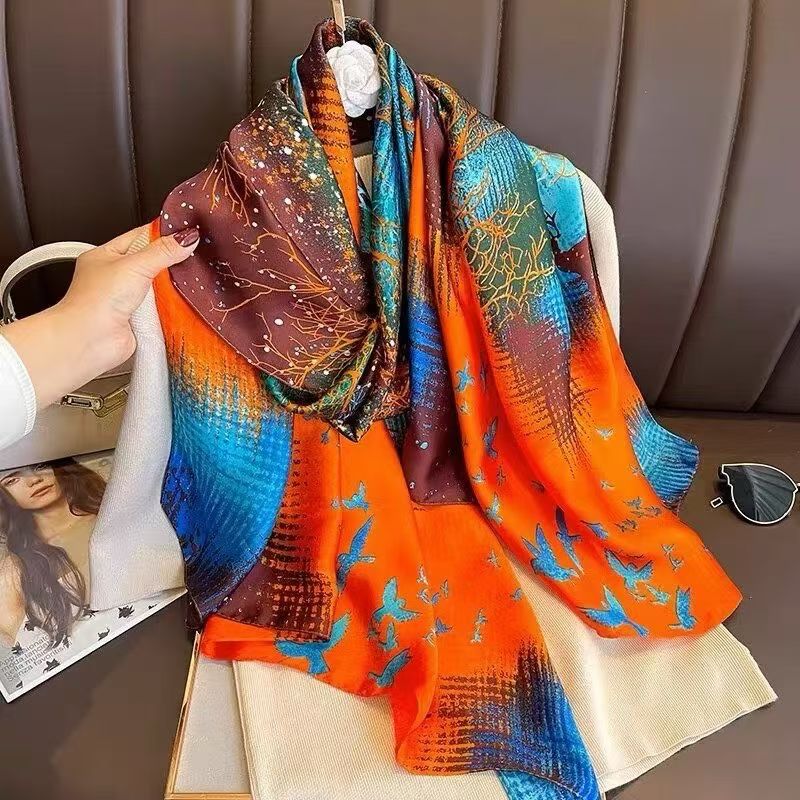 Faux silk long scarves, in multiple styles and colors, with a large quantity of silk scarves in stock