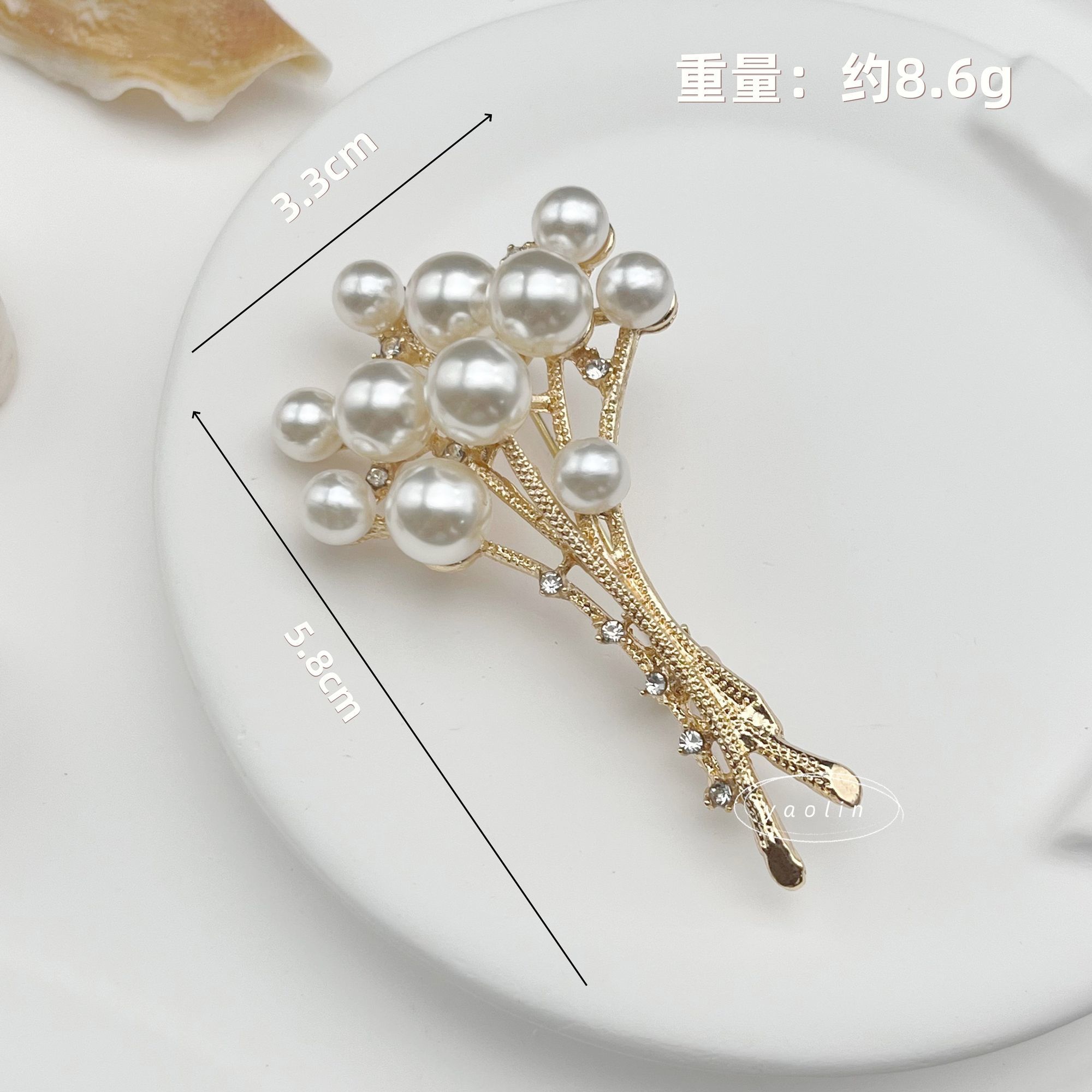 The new pearl bouquet brooch is fashionable, high-end and elegant. It features a high-end brooch for suits, anti-glare coats and accessories, as well as a peach brooch detail image 4