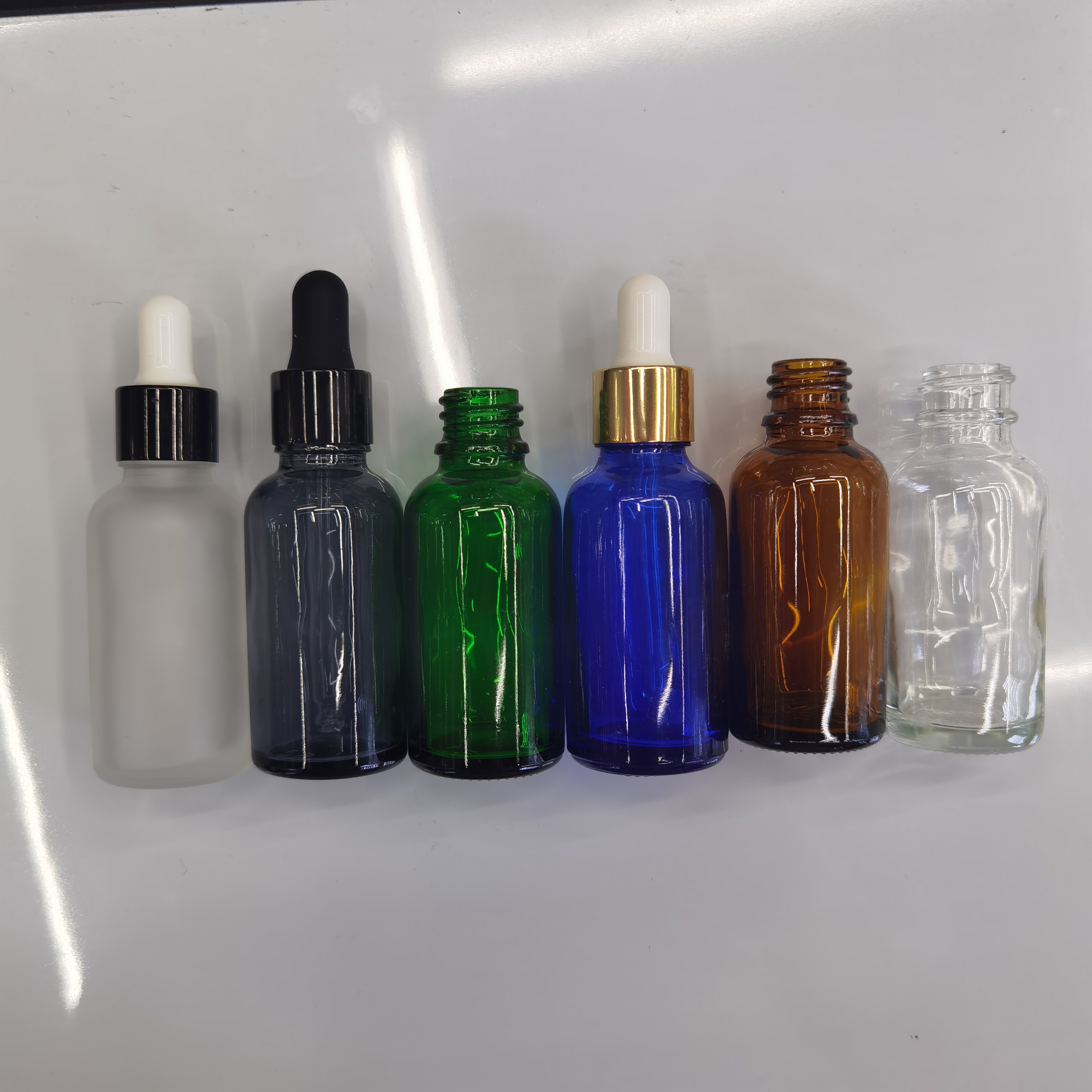 30ml essential oil bottle set in multiple colors: tea, green, blue, transparent. 1