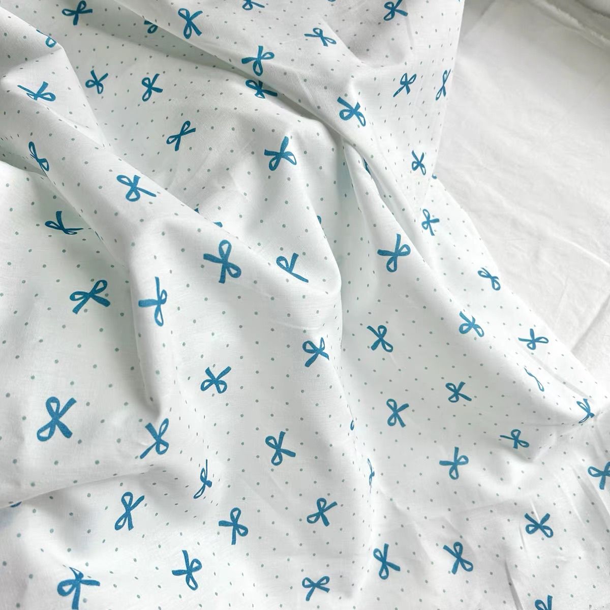 全棉薄薄韩版ins风点点蝴蝶结帆布包桌布童装连衣裙女装衬衫