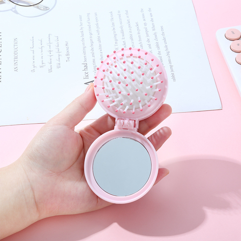 Customized and wholesale of air cushion macaron dual-purpose round mirror portable hair care cute girl comb portable mirror comb Application Scenario
