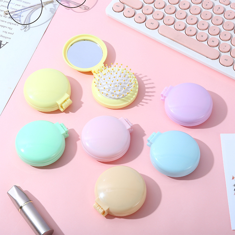 Colchón de aire macaron doble uso espejo redondo cuidado del cabello portátil cute adolescente peine pequeño personalizado al por mayor portátil espejo peine