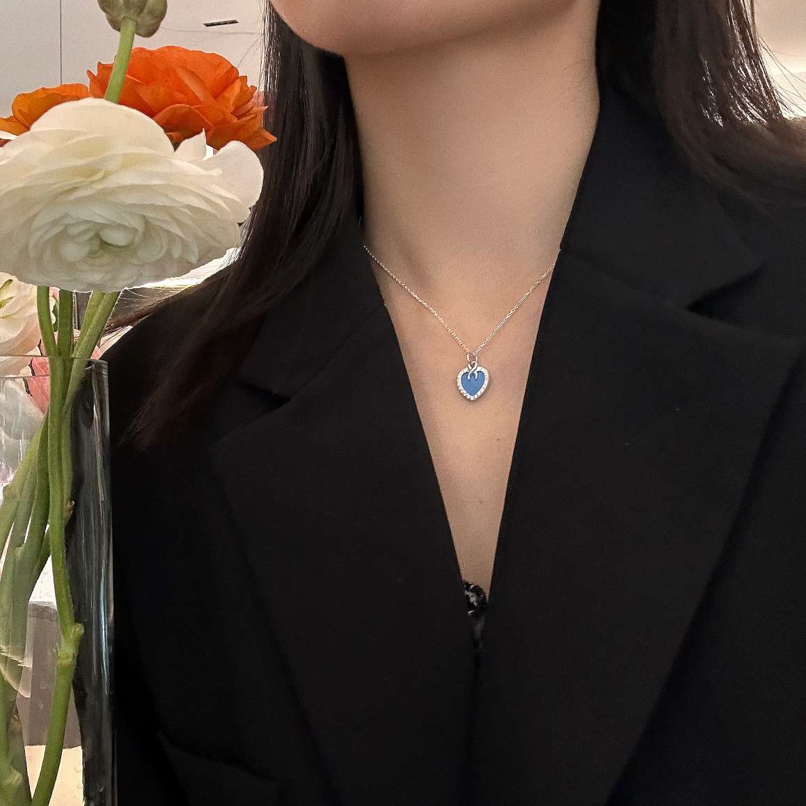 This pure silver blue heart-shaped necklace is a versatile design. It's a perfect gift for your girlfriend