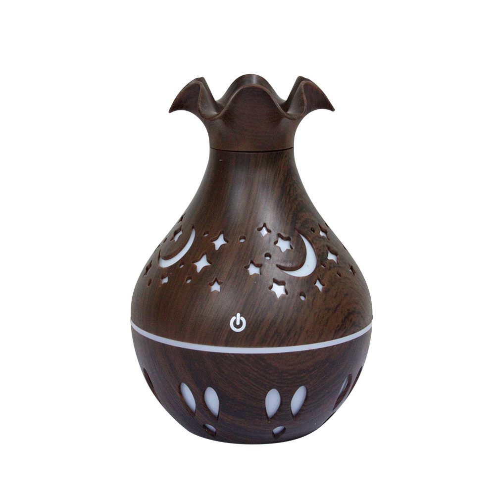 The hollowed-out vase humidifier and wood grain series are best-selling aromatherapy humidifying sprayers Item Picture