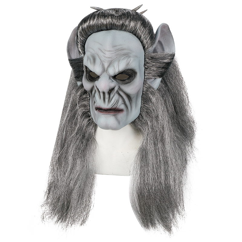 The terrifying demon mask with grey hair, pointed ears and a hideous face is a popular Halloween costume Specification image