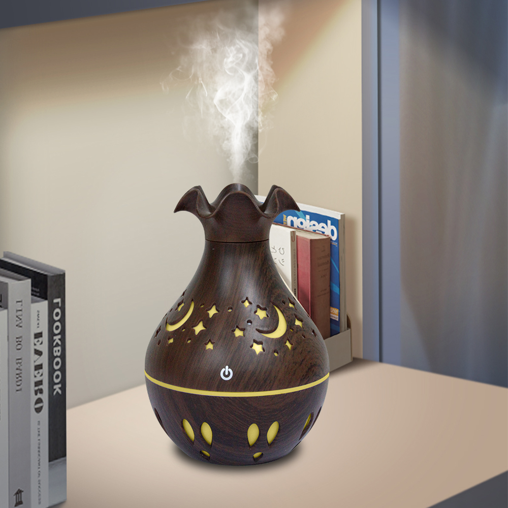 The hollowed-out vase humidifier and wood grain series are best-selling aromatherapy humidifying sprayers Application Scenario