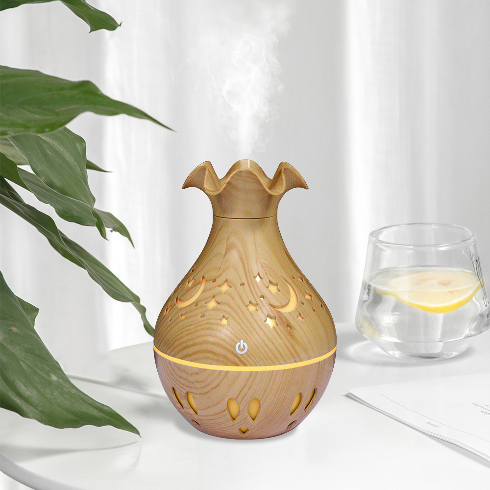 The hollowed-out vase humidifier and wood grain series are best-selling aromatherapy humidifying sprayers details Picture